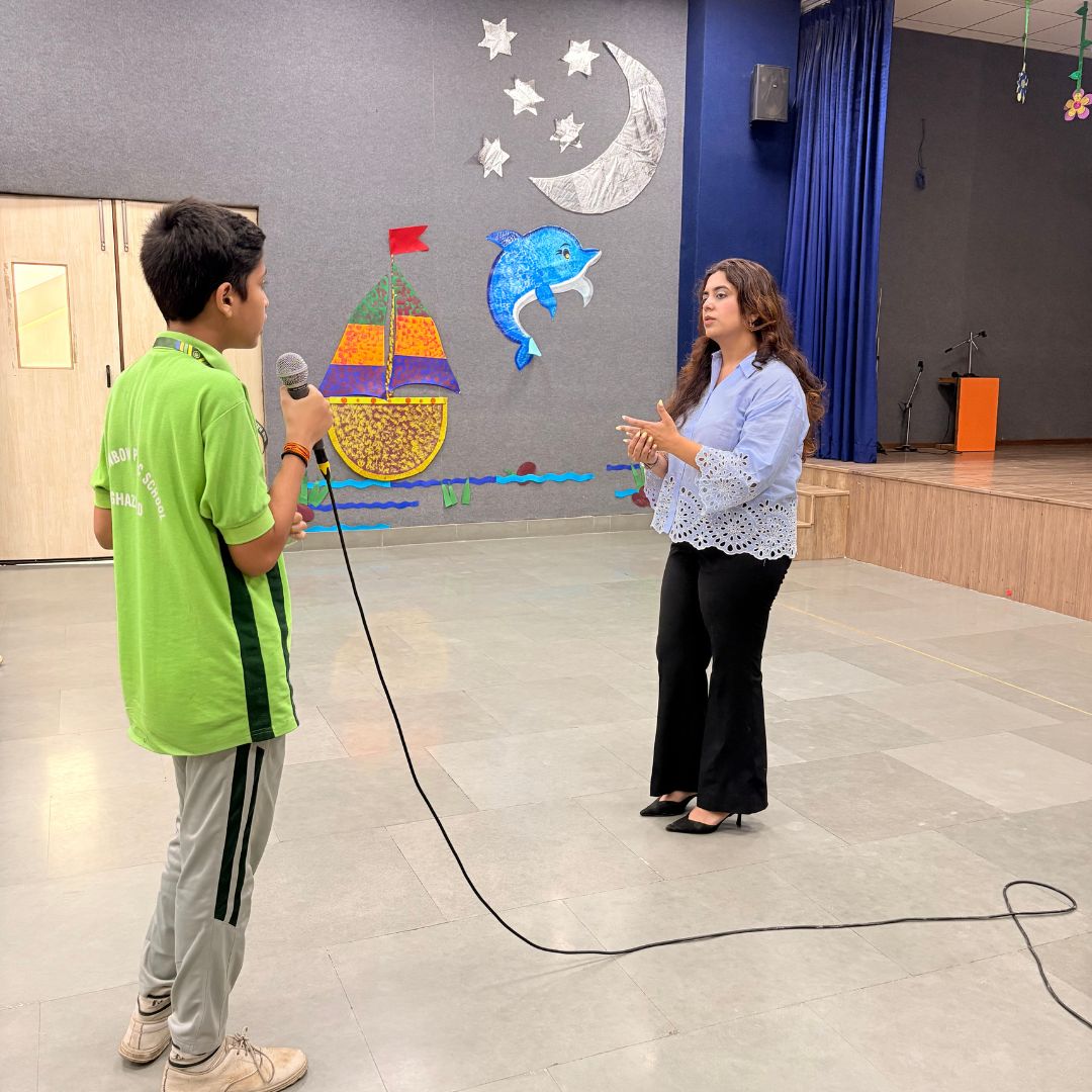 sukriti is talking with stundent 